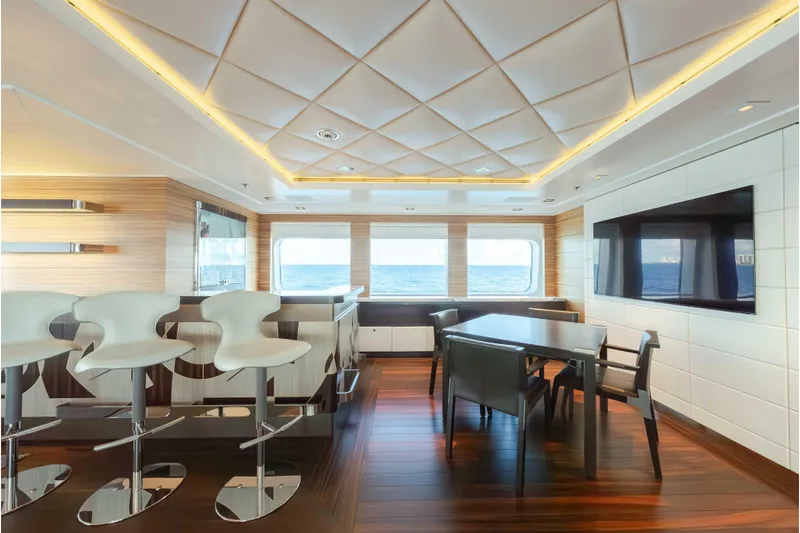 Superyacht W Yacht Photos Pics Luxurious interior of 2013 Feadship motor yacht with modern bar and ocean view.