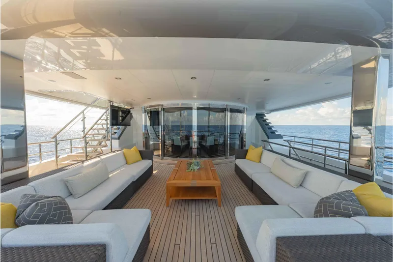 Superyacht W Yacht Photos Pics Luxurious 2013 Feadship motor yacht deck with elegant seating and ocean view.