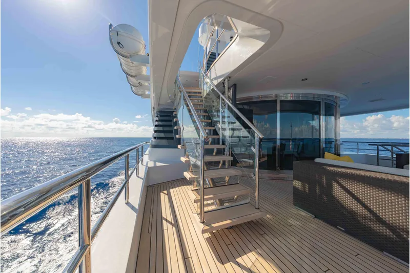 Superyacht W Yacht Photos Pics Luxurious 2013 Feadship motor yacht deck with ocean view and modern staircase.