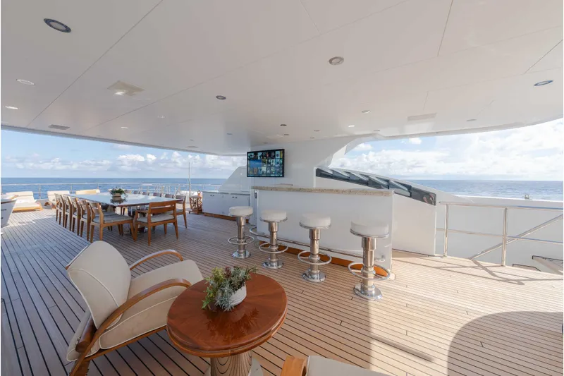Superyacht W Yacht Photos Pics Luxurious 2013 Feadship motor yacht deck with bar, dining area, and ocean view.