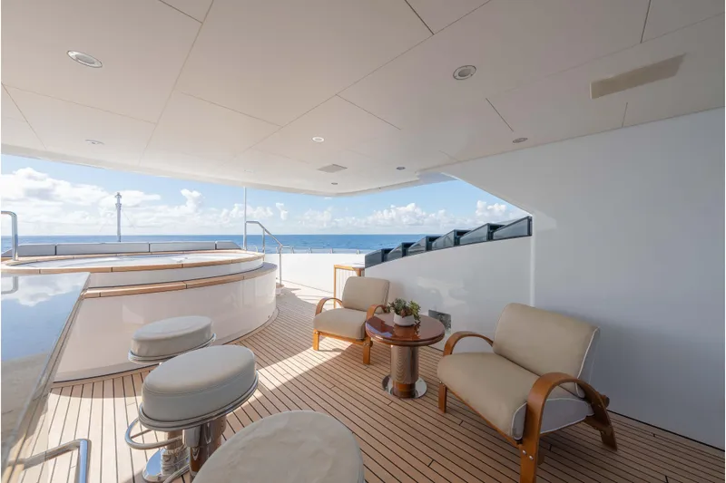 Superyacht W Yacht Photos Pics Luxurious 2013 Feadship motor yacht deck with seating, ocean view, and elegant design.
