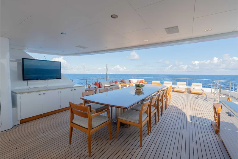 Superyacht W Yacht Photos Pics Luxurious 2013 Feadship motor yacht deck with dining area and ocean view.