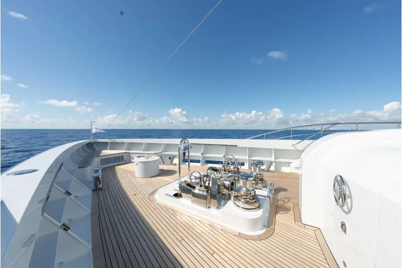 Superyacht W Yacht Photos Pics Luxurious 2013 Feadship motor yacht deck with ocean view and clear blue sky.