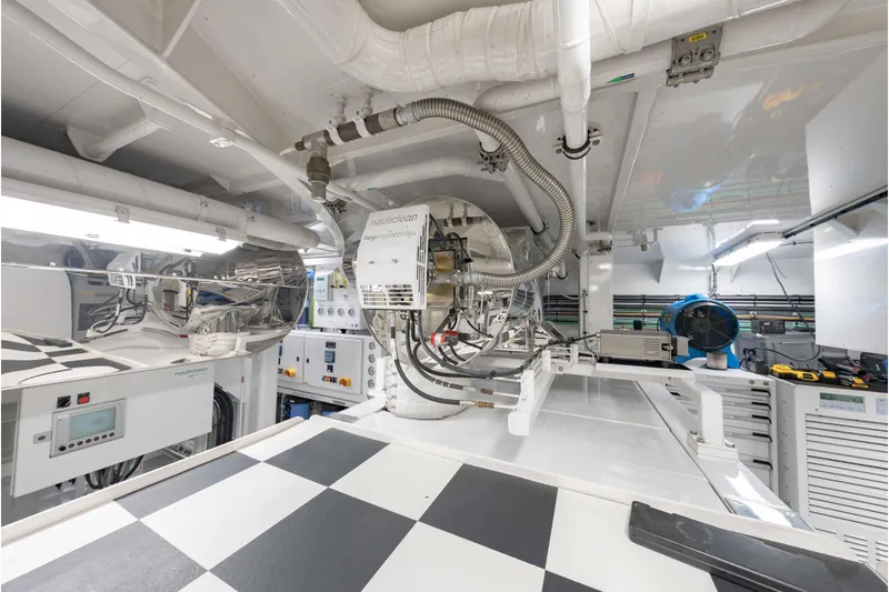 Superyacht W Yacht Photos Pics Engine room of a 2013 Feadship Motor Yacht, featuring advanced machinery and equipment.