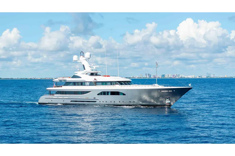 Superyacht W Yacht Photos Pics Luxurious 2013 Feadship motor yacht cruising on open sea under blue sky.