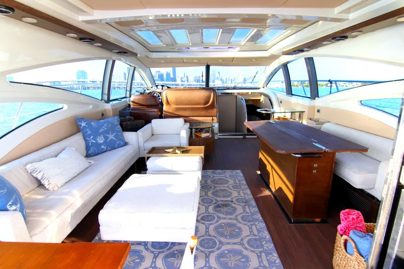  Yacht Photos Pics Luxurious interior of a 2006 Azimut 68S yacht with elegant seating and panoramic windows.