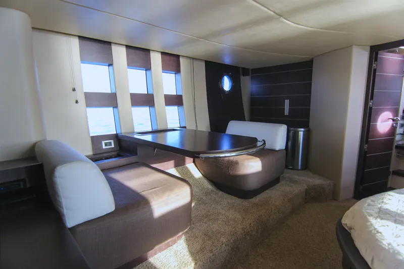  Yacht Photos Pics Luxurious interior of 2006 Azimut 68S yacht with modern seating and large windows.
