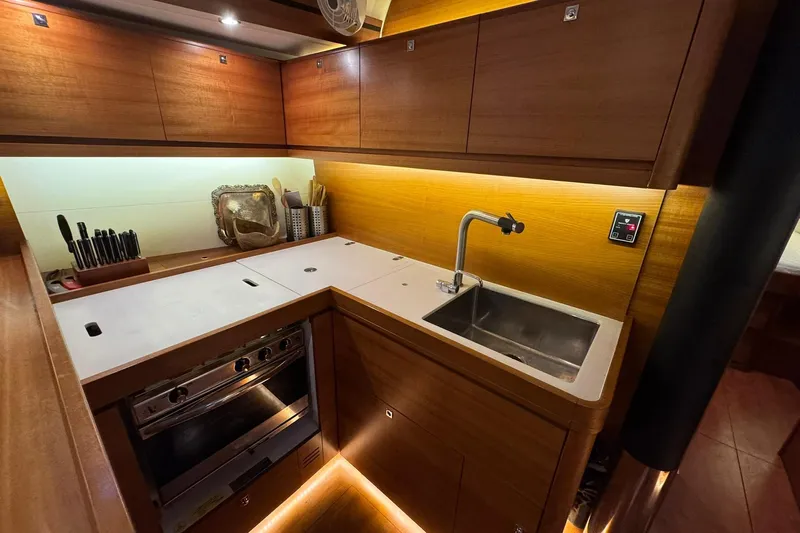 Nine Yacht Photos Pics Modern kitchen in 2016 Dufour 512 Grand Large yacht with sleek wood cabinetry.