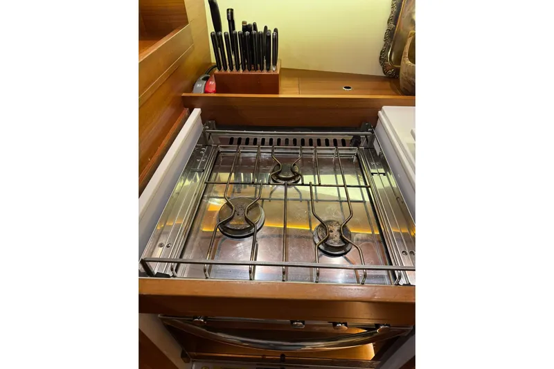 Nine Yacht Photos Pics Stainless steel stove in 2016 Dufour 512 Grand Large yacht kitchen.