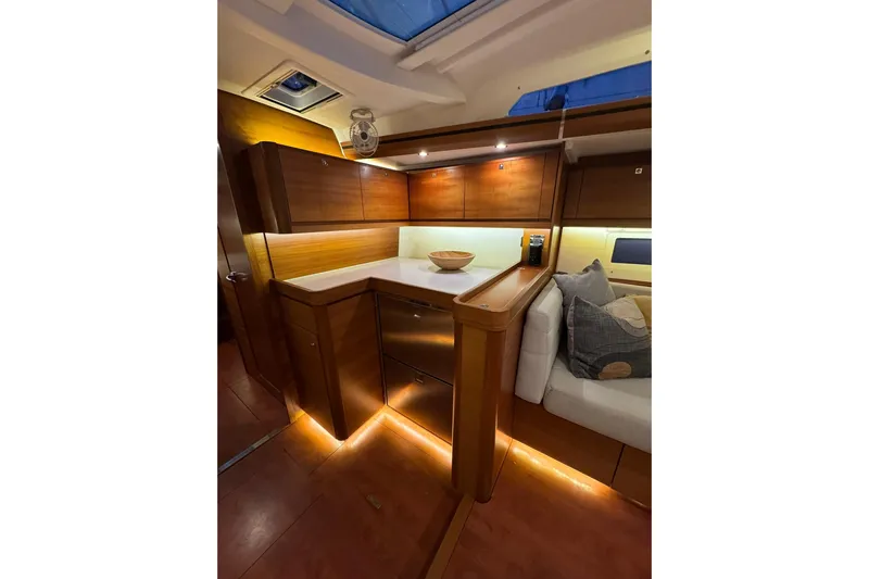Nine Yacht Photos Pics Luxurious interior of 2016 Dufour 512 Grand Large yacht with modern kitchen design.