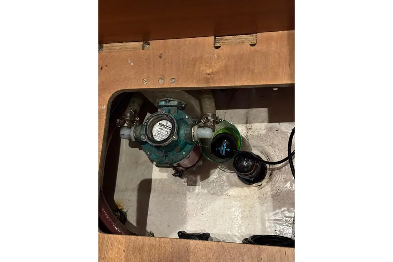 Nine Yacht Photos Pics Bilge pump system in a 2016 Dufour 512 Grand Large sailboat.