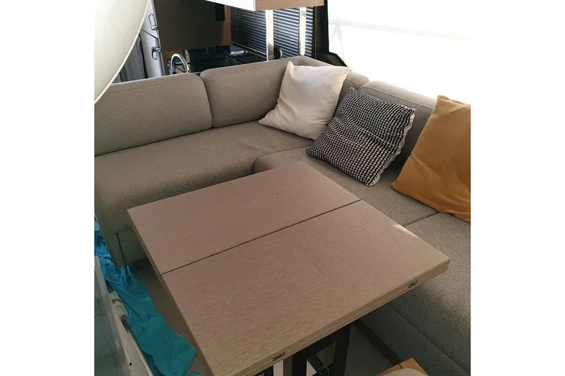 Amarsi Yacht Photos Pics Luxurious interior of 2023 Prestige 520 yacht with cozy seating and stylish cushions.