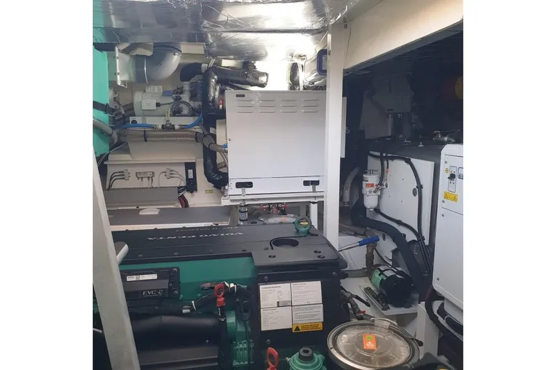 Amarsi Yacht Photos Pics Engine room of 2023 Prestige 520 yacht, featuring advanced mechanical systems and equipment.