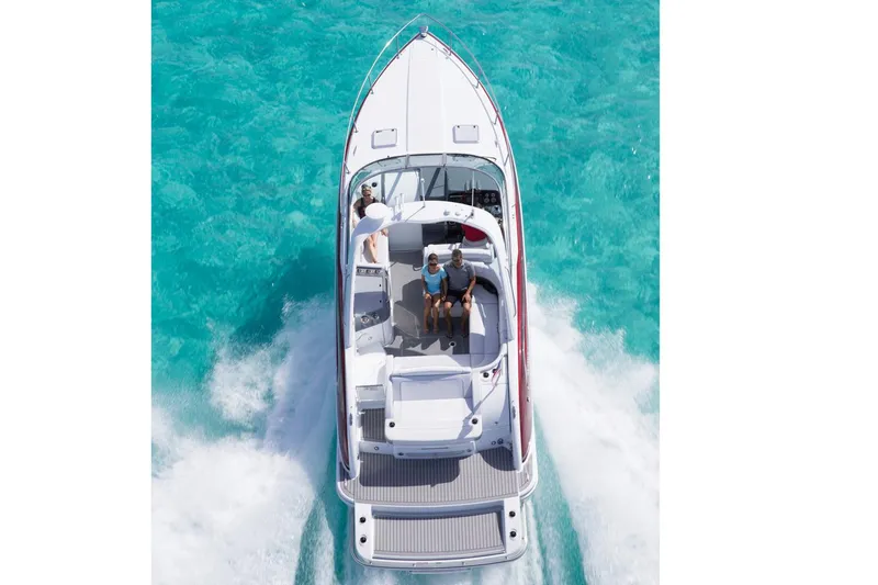Gratitude Yacht Photos Pics Manufacturer Provided Image: 2015 Formula 350 Sun Sport boat cruising on clear turquoise water.