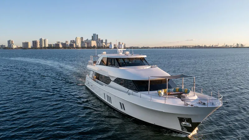 Sea N Sea Yacht Photos Pics Luxury 2016 Ocean Alexander Skylounge yacht cruising near city skyline.