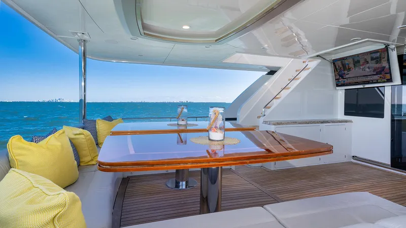 Sea N Sea Yacht Photos Pics Luxurious 2016 Ocean Alexander Skylounge yacht interior with ocean view, elegant seating, and TV.