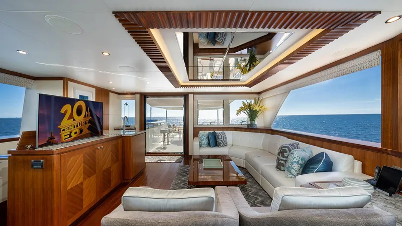 Sea N Sea Yacht Photos Pics Luxurious 2016 Ocean Alexander Skylounge interior with ocean view, elegant seating, and entertainment system.