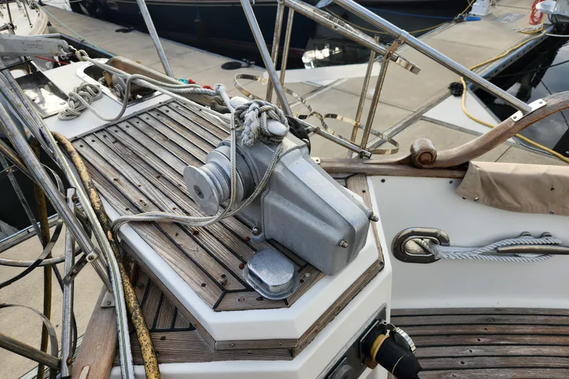 Part Of The Plan Yacht Photos Pics Deck of 1990 Grand Banks 46 Classic yacht with winch and ropes.