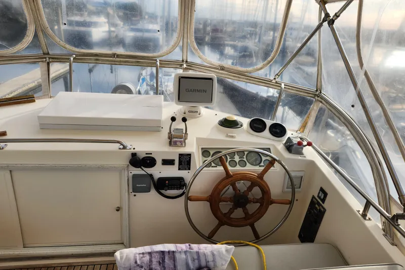 Part Of The Plan Yacht Photos Pics Helm of 1990 Grand Banks 46 Classic yacht with Garmin navigation system.