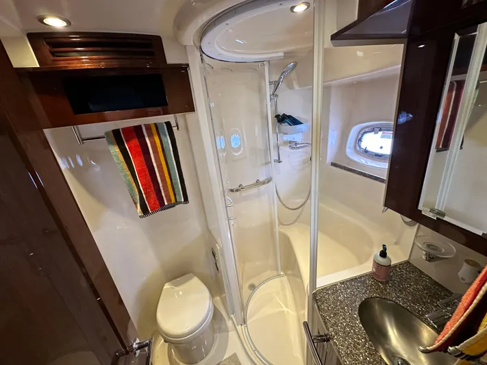 Mia Yacht Photos Pics Luxurious bathroom in 2009 Sea Ray 60 Sundancer yacht with shower and modern fixtures.