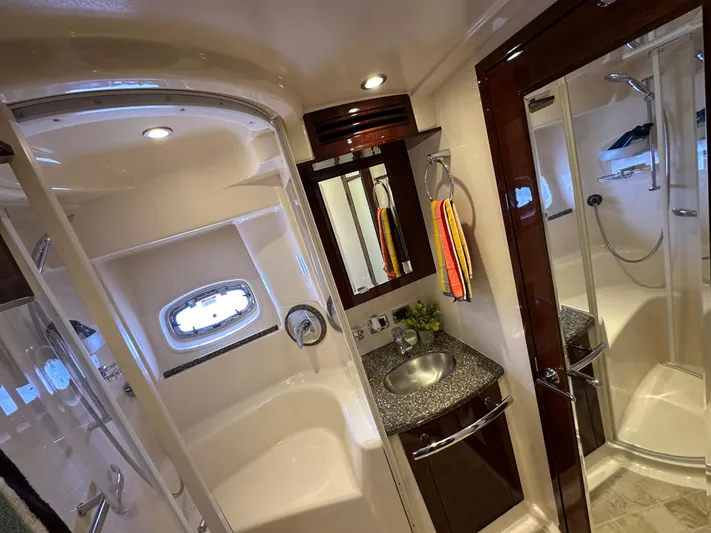 Mia Yacht Photos Pics Luxurious bathroom in 2009 Sea Ray 60 Sundancer yacht with modern fixtures and elegant design.