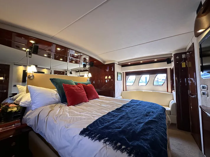 Mia Yacht Photos Pics Luxurious bedroom interior of 2009 Sea Ray 60 Sundancer yacht with elegant decor.