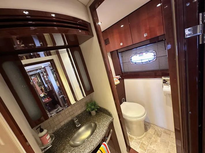 Mia Yacht Photos Pics Luxurious bathroom interior of 2009 Sea Ray 60 Sundancer yacht with modern fixtures.
