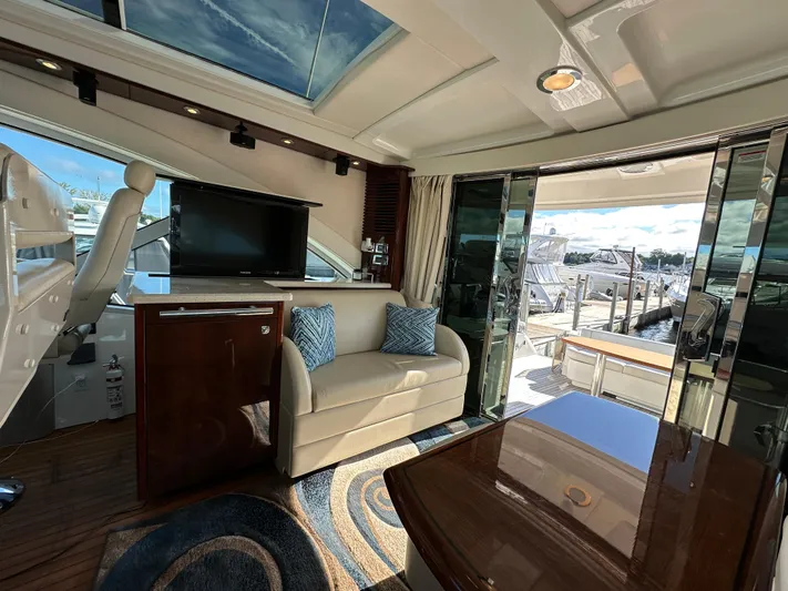 Mia Yacht Photos Pics Luxurious interior of 2009 Sea Ray 60 Sundancer yacht with plush seating and modern amenities.