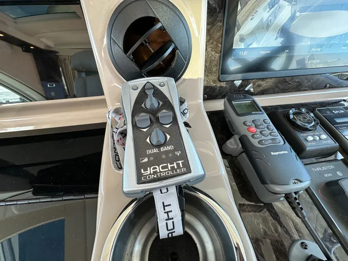 Mia Yacht Photos Pics Control panel of a 2009 Sea Ray 60 Sundancer with yacht controller and navigation equipment.