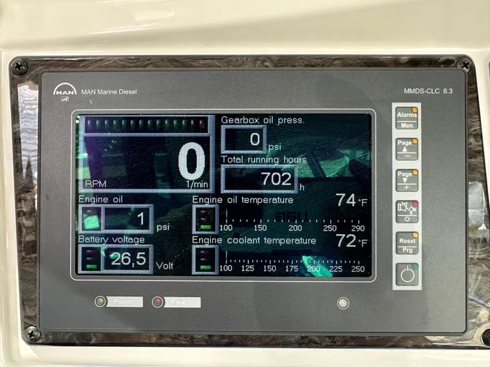 Mia Yacht Photos Pics Control panel of a 2009 Sea Ray 60 Sundancer displaying engine metrics and alerts.