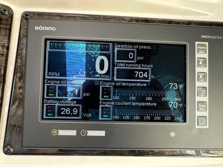 Mia Yacht Photos Pics Digital display panel on a 2009 Sea Ray 60 Sundancer showing engine metrics and battery voltage.