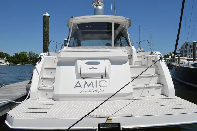 Amici Yacht Photos Pics 2019 Azimut Atlantis 51 yacht docked at marina, rear view.