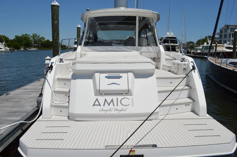 Amici Yacht Photos Pics 2019 Azimut Atlantis 51 yacht docked at marina, rear view.