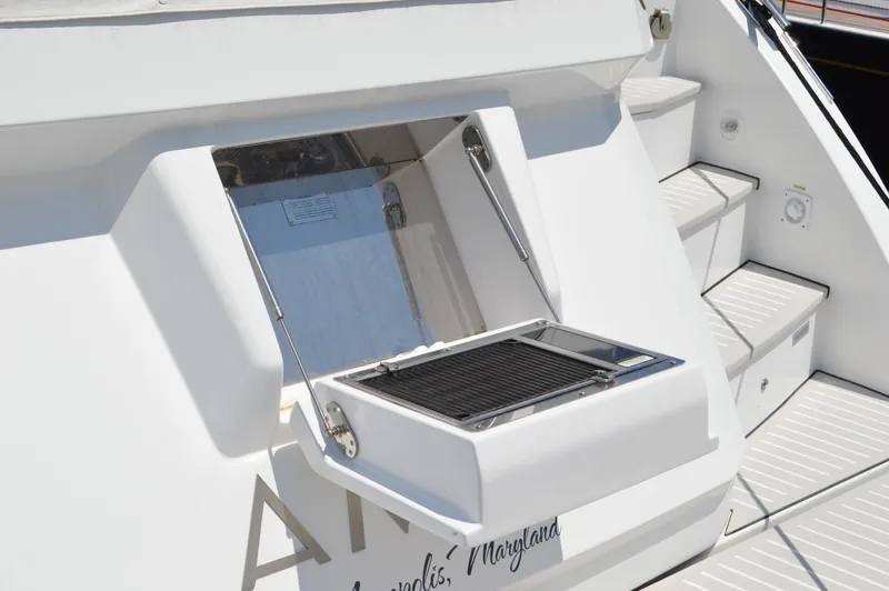 Amici Yacht Photos Pics 2019 Azimut Atlantis 51 yacht with built-in outdoor grill on deck.