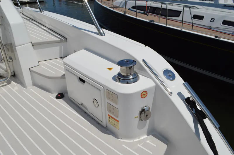 Amici Yacht Photos Pics 2019 Azimut Atlantis 51 yacht deck with winch and storage compartment.