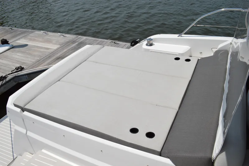 Amici Yacht Photos Pics 2019 Azimut Atlantis 51 yacht with spacious sunbathing area by the water.