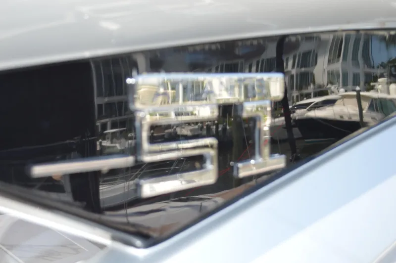 Amici Yacht Photos Pics 2019 Azimut Atlantis 51 yacht emblem with reflective surface.