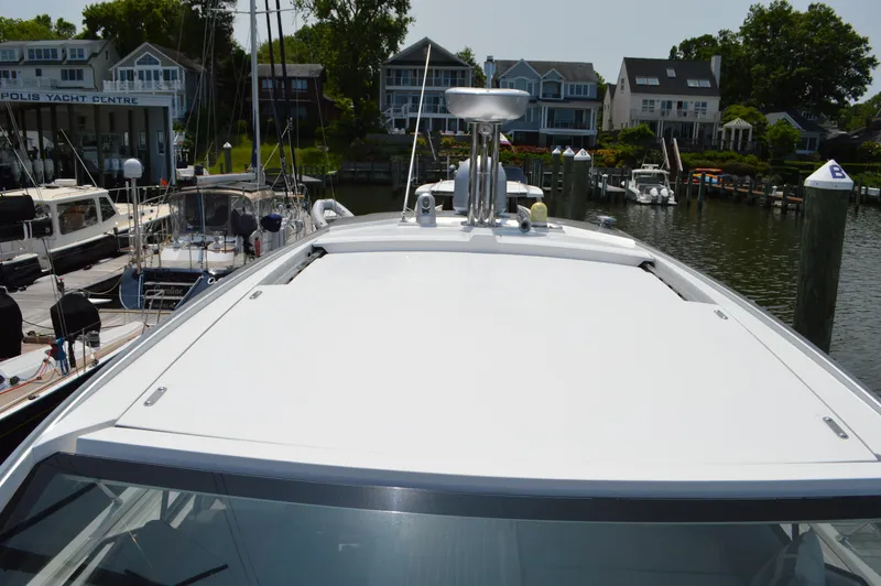 Amici Yacht Photos Pics 2019 Azimut Atlantis 51 yacht docked at marina, showcasing sleek design and modern features.