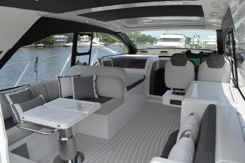 Amici Yacht Photos Pics 2019 Azimut Atlantis 51 yacht interior with modern seating and sleek design.