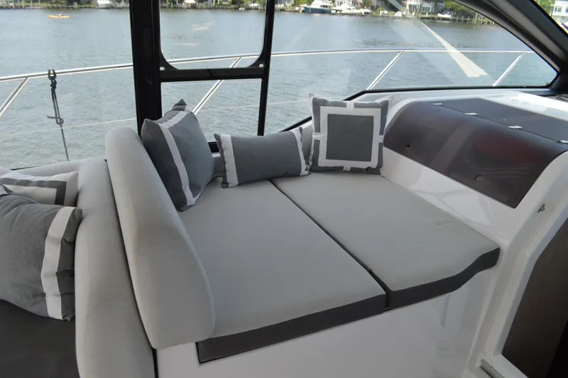 Amici Yacht Photos Pics Luxurious seating area on 2019 Azimut Atlantis 51 yacht with stylish cushions.