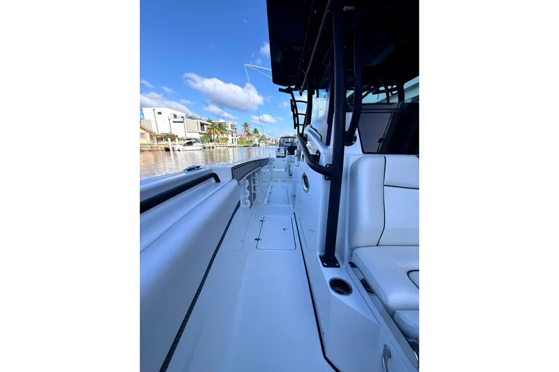  Yacht Photos Pics 2021 Wellcraft 302 Scarab boat interior with sleek seating and modern design.