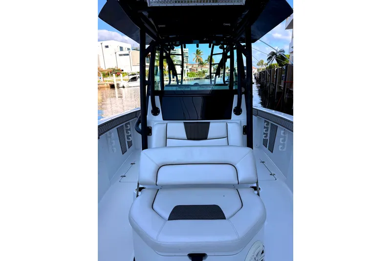  Yacht Photos Pics 2021 Wellcraft 302 Scarab boat interior with white seating and modern design.