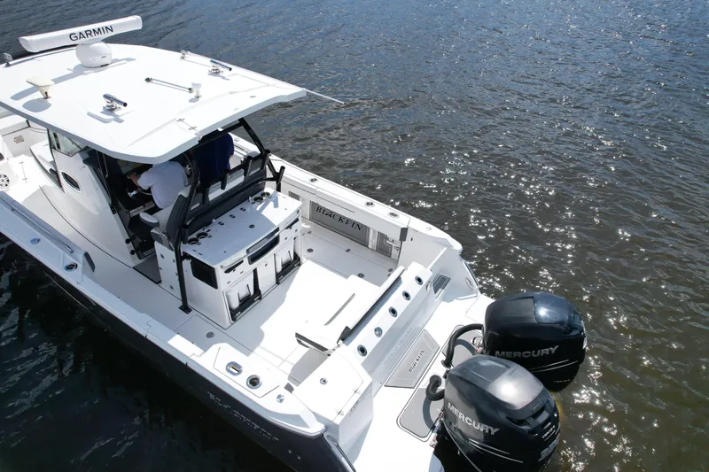  Yacht Photos Pics 2021 Blackfin 332 CC boat with dual Mercury engines on water.