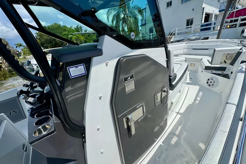  Yacht Photos Pics 2021 Blackfin 332 CC boat interior with seating and storage compartments.