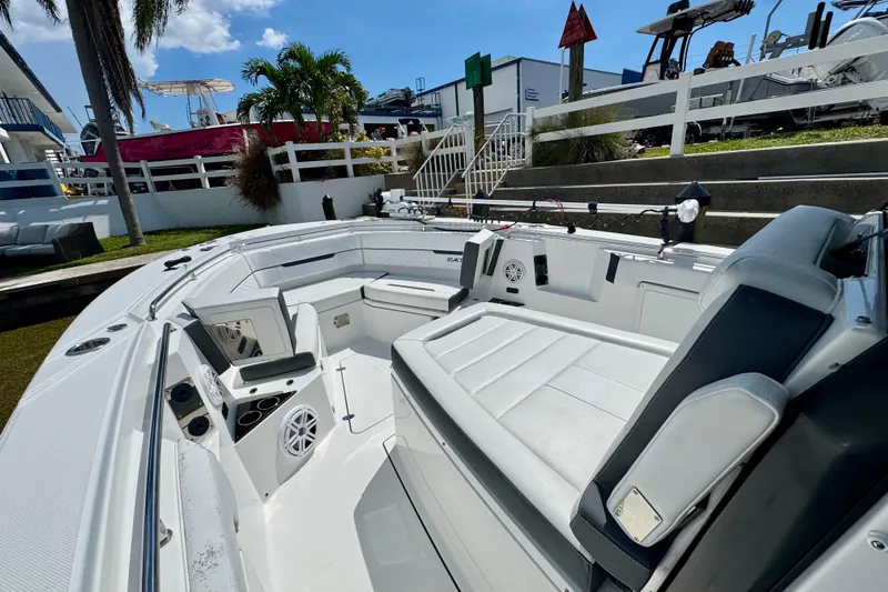  Yacht Photos Pics 2021 Blackfin 332 CC boat interior with seating and fishing rod holders.