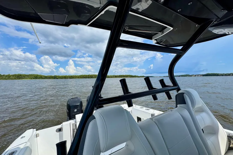  Yacht Photos Pics 2021 Blackfin 332 CC boat interior with lake view and blue sky.