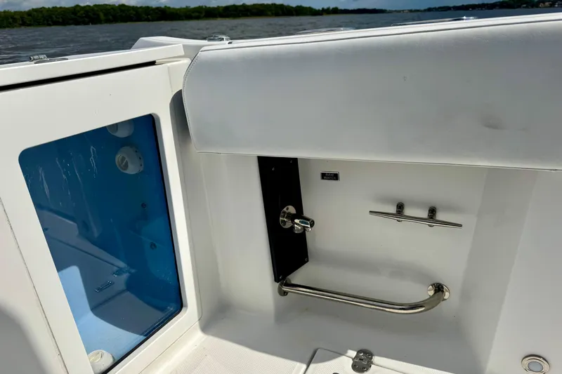  Yacht Photos Pics 2021 Blackfin 332 CC boat interior with stainless steel fixtures and storage compartment.
