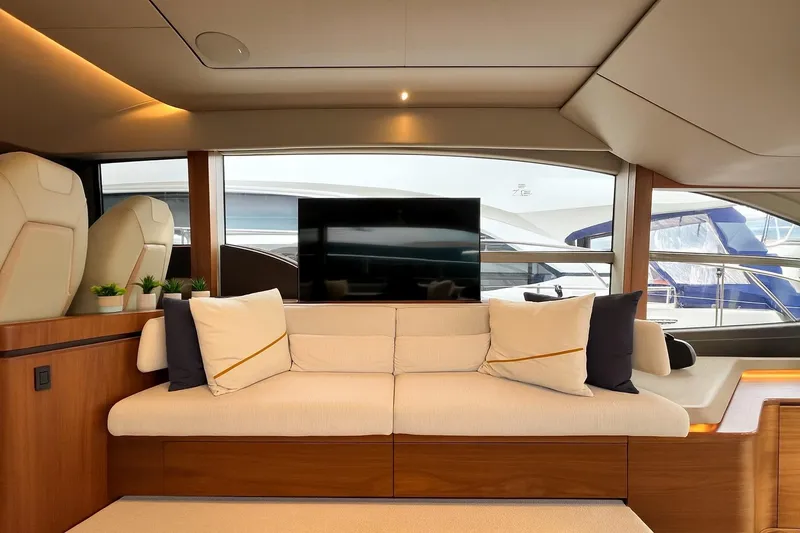  Yacht Photos Pics Luxurious interior of 2021 Princess F55 yacht with elegant seating and modern decor.