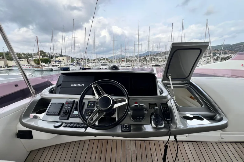  Yacht Photos Pics Helm of 2021 Princess F55 yacht with Garmin navigation, docked in marina.