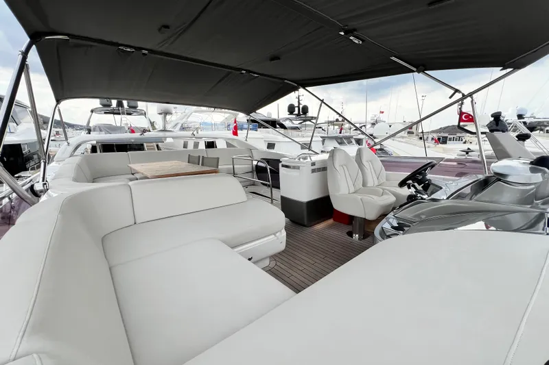  Yacht Photos Pics Luxurious 2021 Princess F55 yacht interior with elegant seating and modern helm.